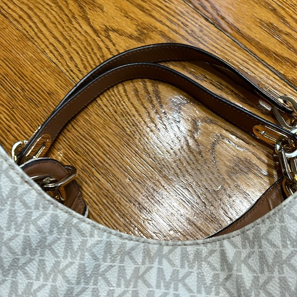 Michael Kors handbag. Vanilla color with tan straps and gold hardware. - Picture 3 of 16